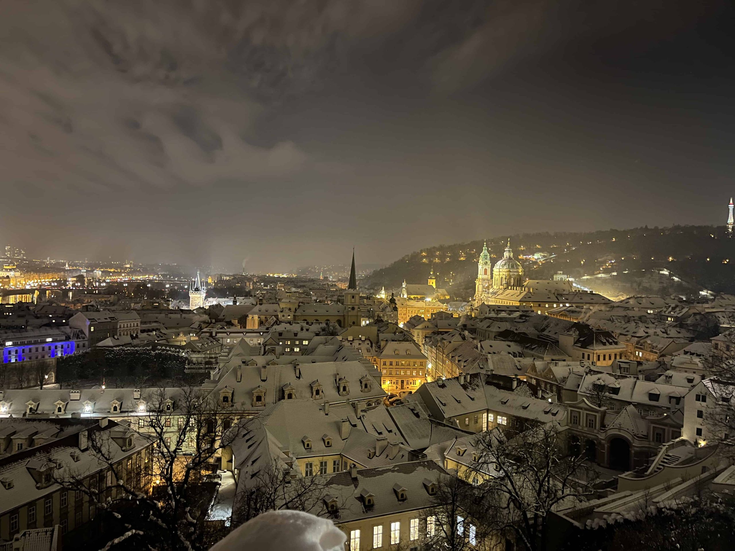 Night view from Prague Castle over the city after a snow storm
