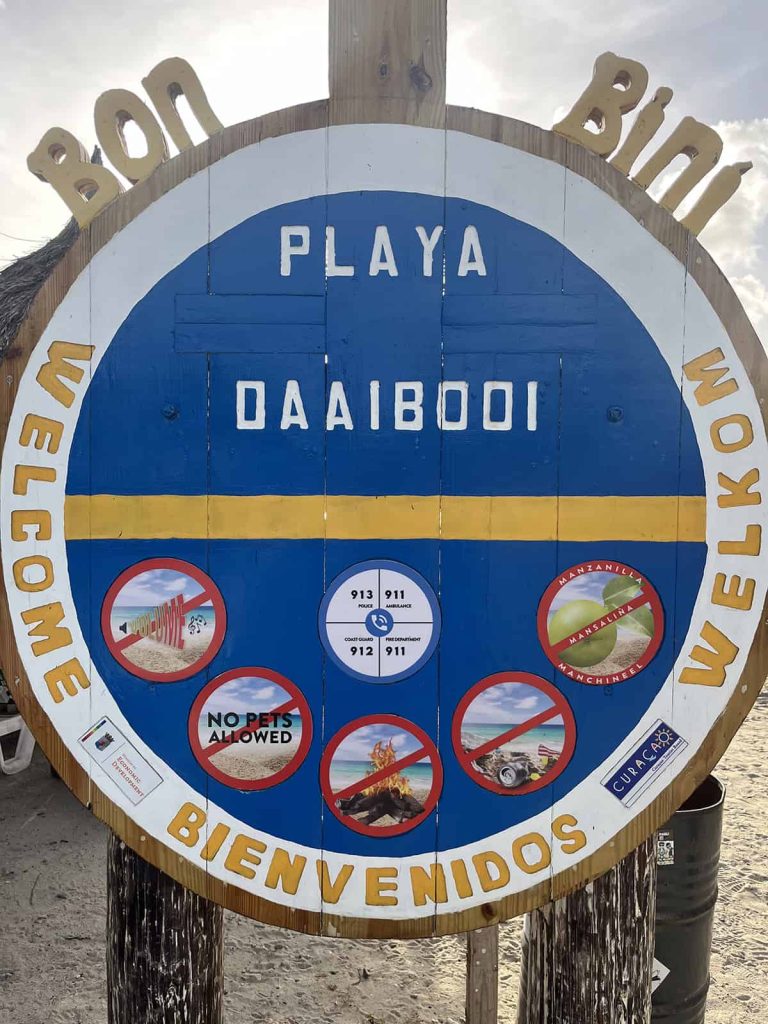 The sign at the entrance to Playa Daaibooi the best beach for snorkeling in Curacao
