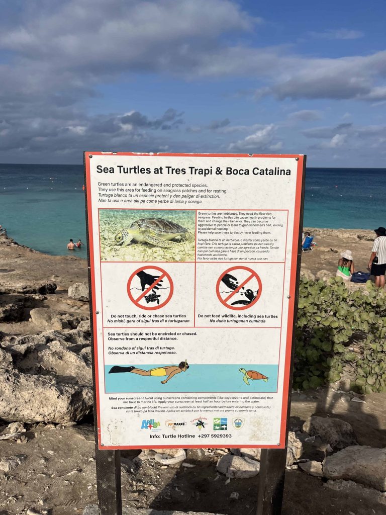 Beach sign at Tres Trapi beach.