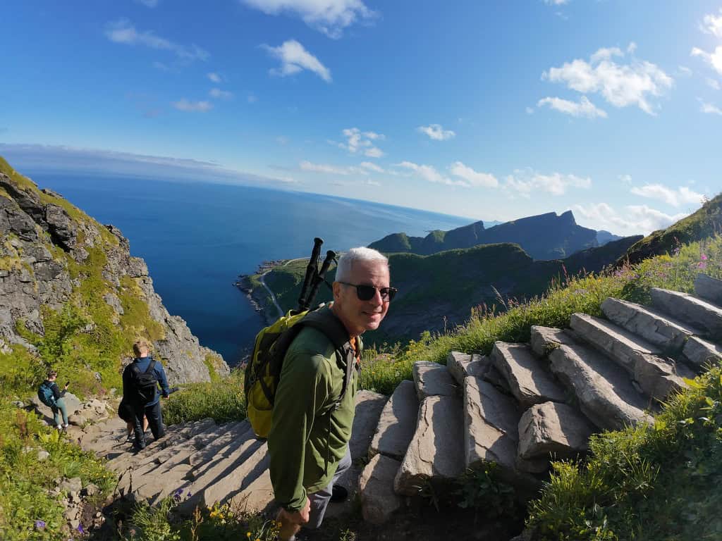 Mike climbing the 1a978 steps to the top of Reinebringen.