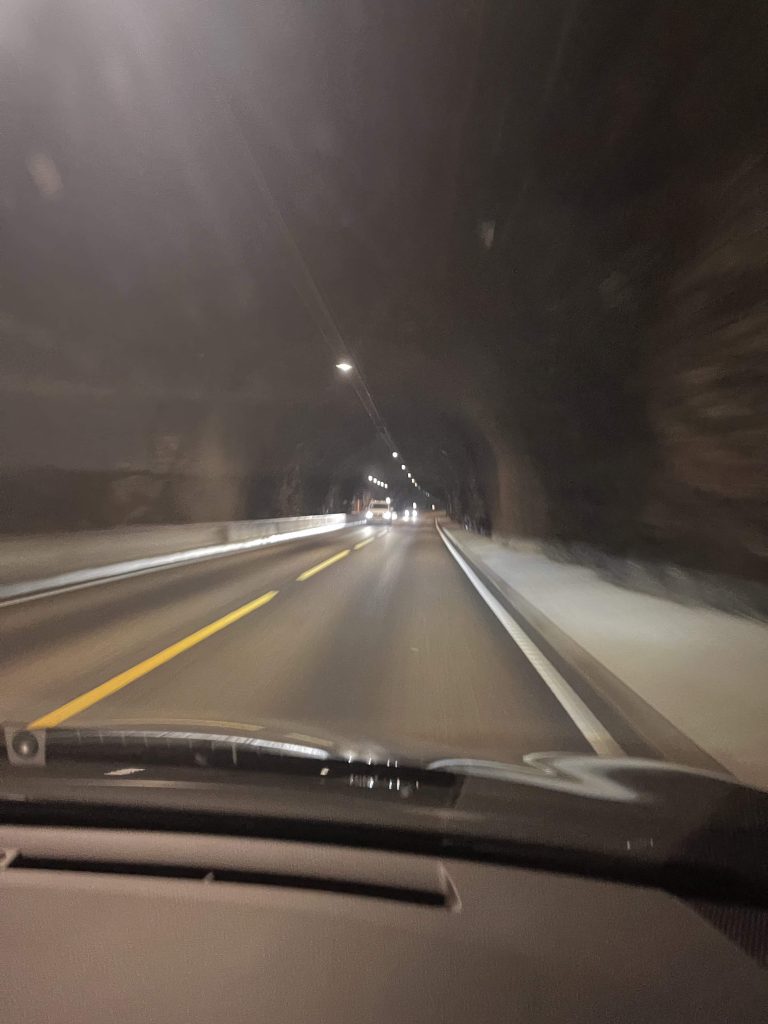 Inside a tunnel while driving in Norway.